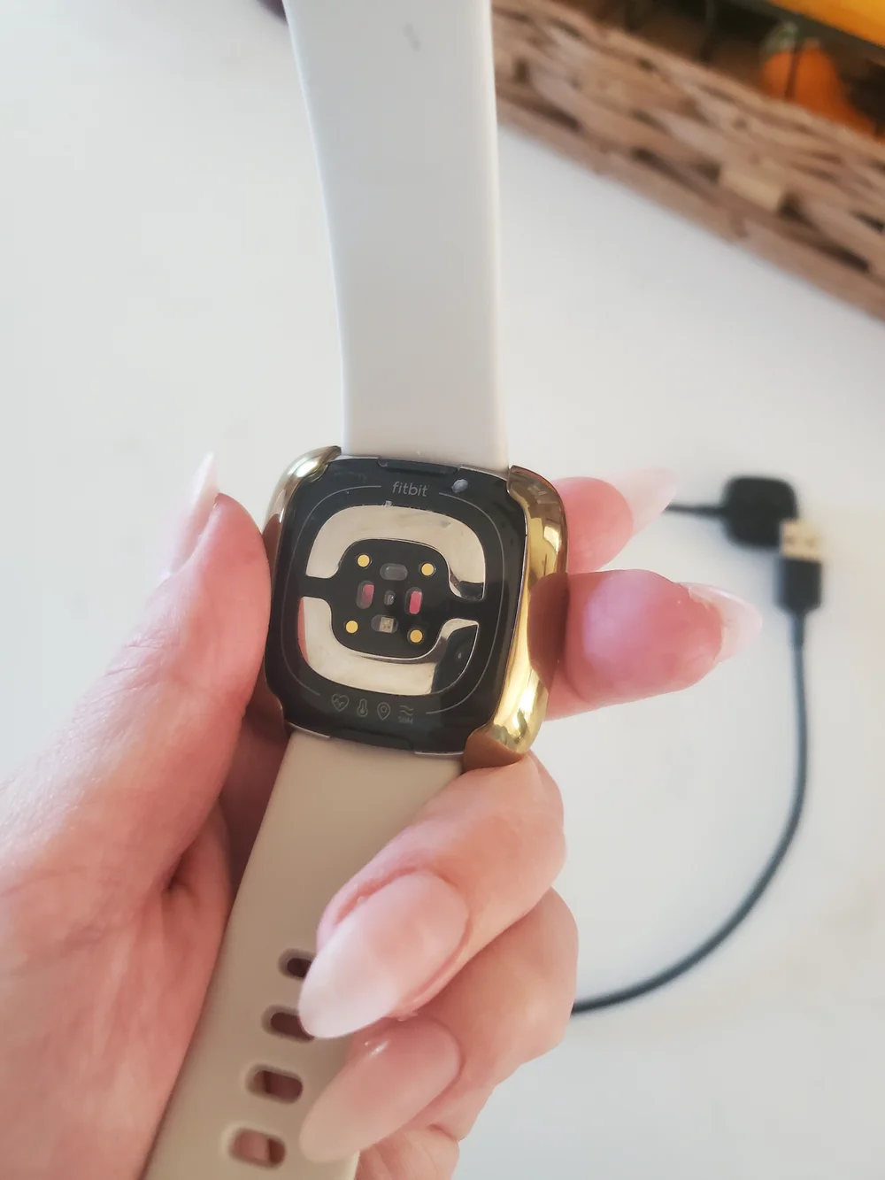 Fitbit Sense 2 smartwatch With Charger And Gold Screen Protector.